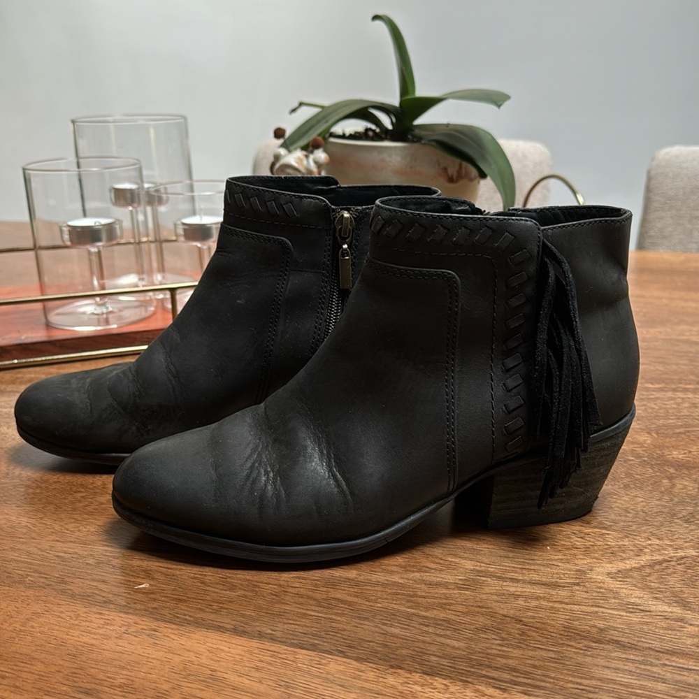 Clarks leather booties with fringe and lace-up detail. Black, size 8